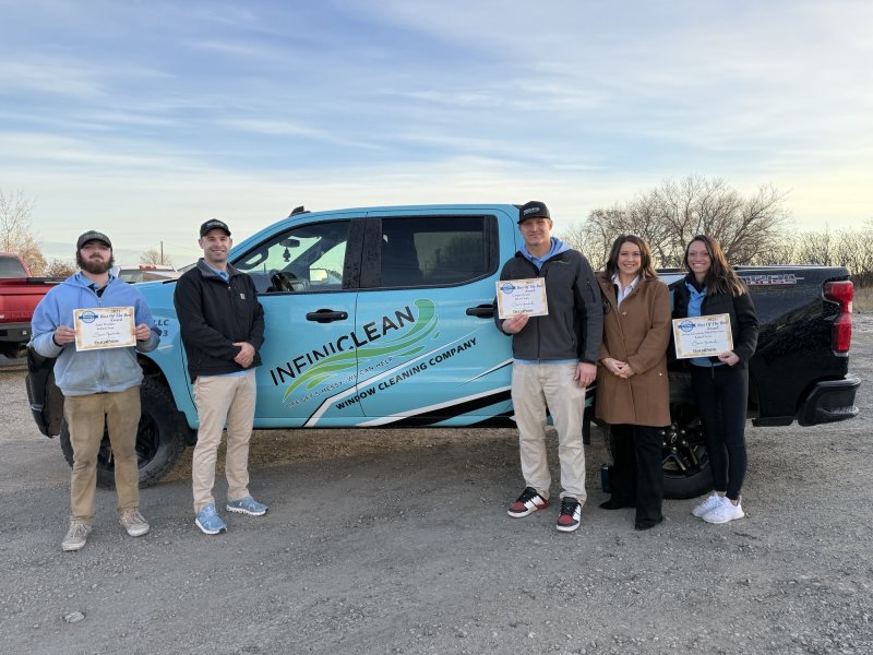 Shoe, Pants, Hat, Person. Text: LLC INFINICLEAN WINDOW CLEANING COMPANY