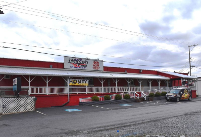 Car, Building, City, Wheel. Text: Taylor&#039;s Farm MARKET HONEY DB