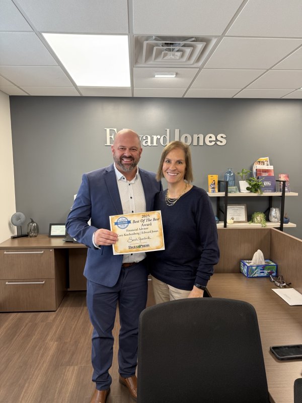 Blazer, Adult, Person, Woman. Text: F ard lones 2025 Best Of The Best Award Financial Advisor Cory Kuchenberg Edward Jones