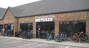 Spoke, Car Dealership, Vehicle, Shop. Text: BICYCLES -