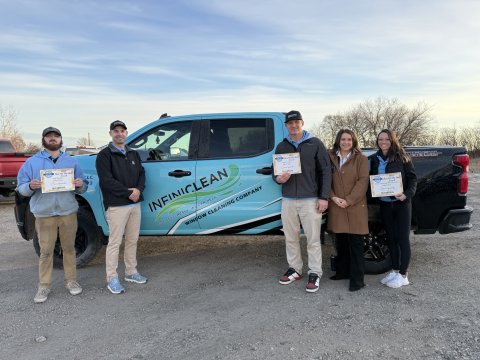 Shoe, Pants, Hat, Person. Text: LLC INFINICLEAN WINDOW CLEANING COMPANY