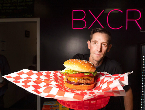 Burger, Adult, Man, Person. Text: BXCR