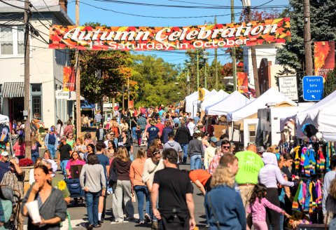 Urban, Adult, Man, Person. Text: Autumn Celebration 1st Saturday in October Welcome to DAYT Thomas Welcome to Tourist DAYTON House Welcome to Info DAYTON Restaurant and Center COTTAGE Private Dining