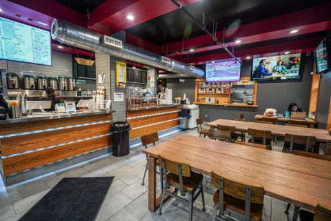 Restaurant, Person, Interior Design, Laptop. Text: ORDER HERE Attention