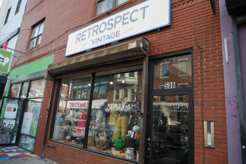 Deli, Shop, Car, Handbag. Text: 2001 RETROSPECT VINTAGE EST. as 508 955 APRIL