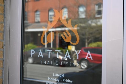 Advertisement, Poster, Car, Spoke. Text: PATTAYA THAI CUISINE LUNCH 11:00am