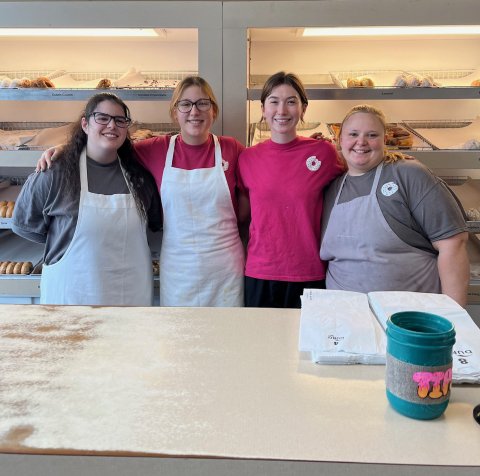 Glasses, Person, Adult, Woman. Text: Lemon Dutch Crumb Double Chocolate Dew ck Rasp 8