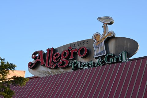 Logo, Emblem, Symbol, Restaurant. Text: Est. 1982 Pizza &amp; Grill