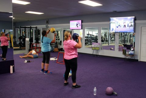 Adult, Female, Person, Woman. Text: TEAM TRAINING WITH A COACH