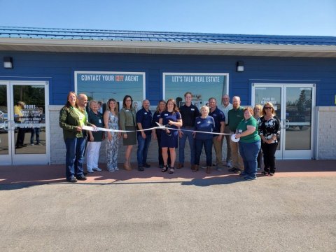 Pants, Shelter, Person, Woman. Text: CONTACT YOUR KEY AGENT LET'S TALK REAL ESTATE PLEASE USE HOURS MONDAY FRIDAY