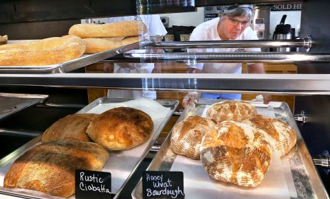 Shop, Bread, Man, Person. Text: FETCO Rustic Honey Ciabatta Sourdough