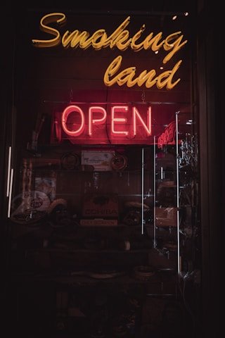 Light, Restaurant, Neon, Shop. Text: Smoking land OPEN