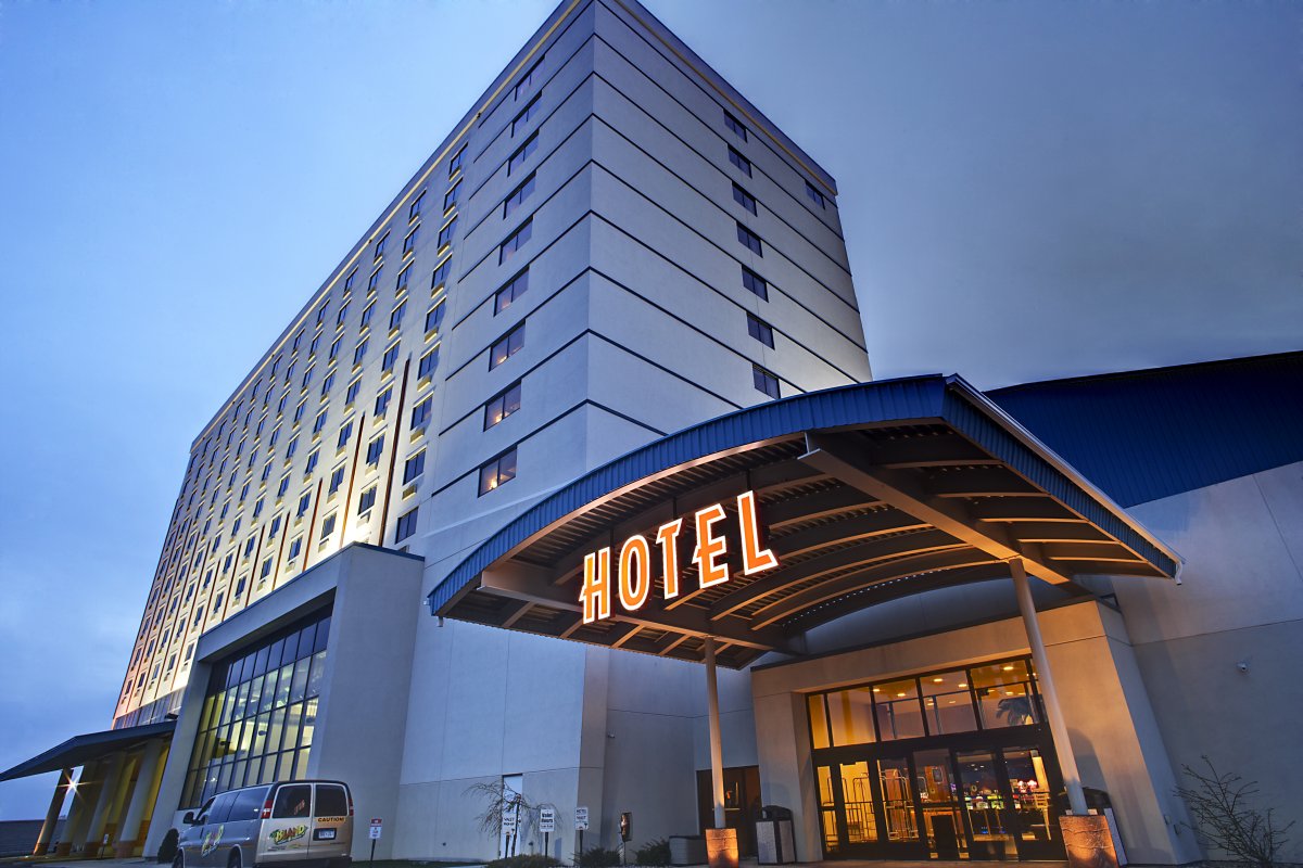 Building, Office Building, Hotel, City. Text: HOTEL