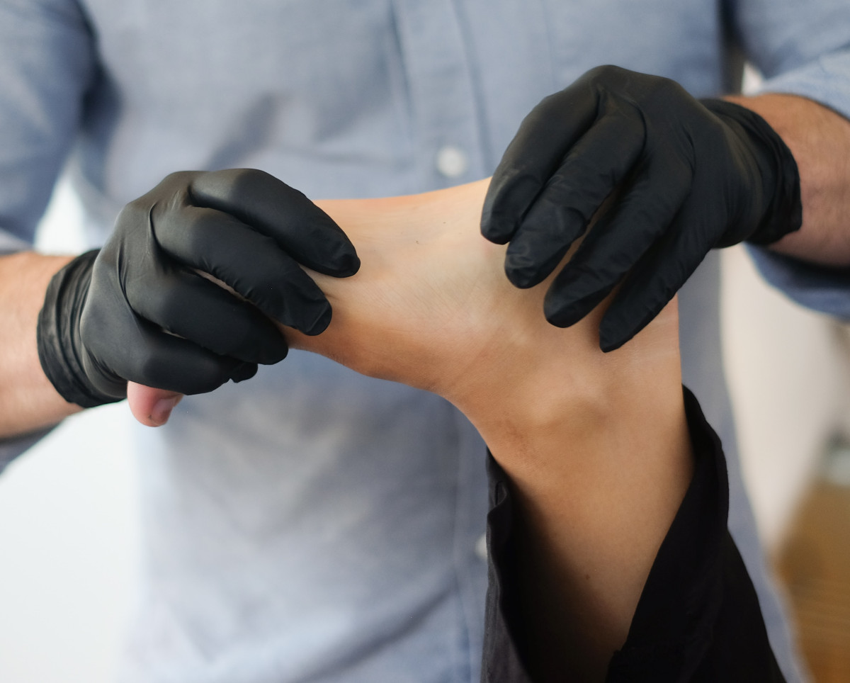 Glove, Skin, Hand, Wrist.