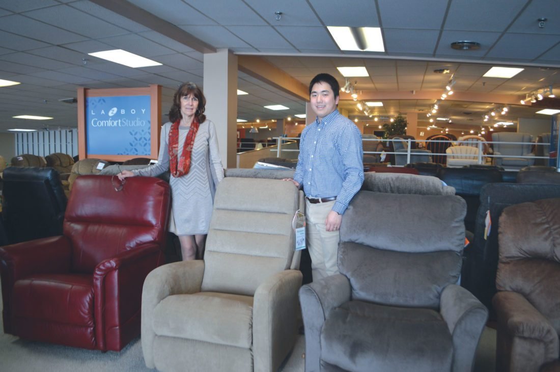 Furniture, Couch, Person, Woman. Text: LAD BOY ComfortStudio