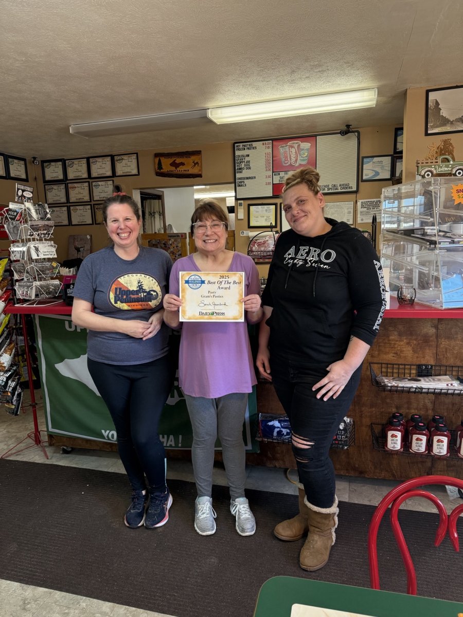 Pants, T-Shirt, Shoe, Portrait. Text: $8.00 HOT PASTIES FROZEN PASTIES Sprite CHEESEBURGER CHIPS 250 SNAILS OR SPECIAL ORDERS SN YOUR AERO Eighty Seven 2025 Best Of The Best MICHIGAN Award Pasty YO