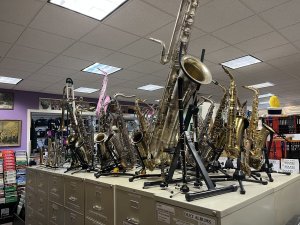 Musical Instrument, Chandelier, Indoors, Saxophone.