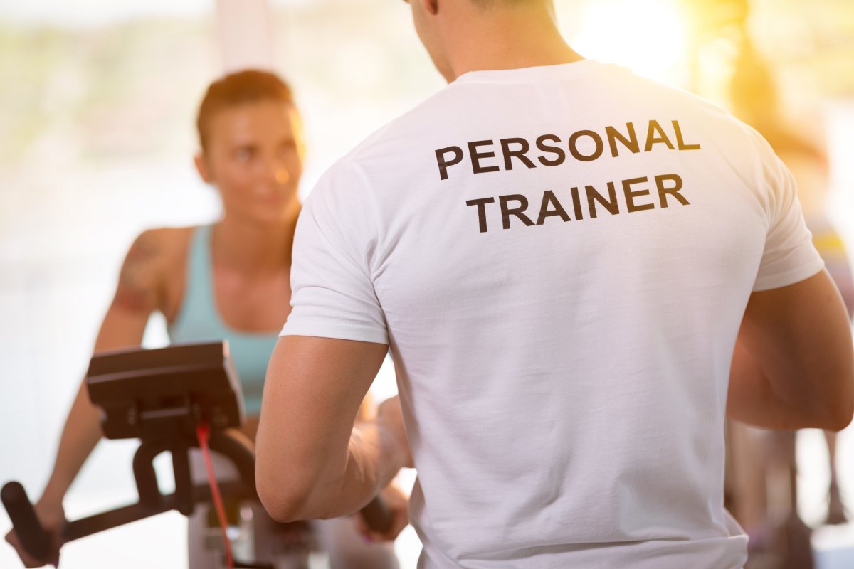 Adult, Male, Man, Person. Text: PERSONAL TRAINER