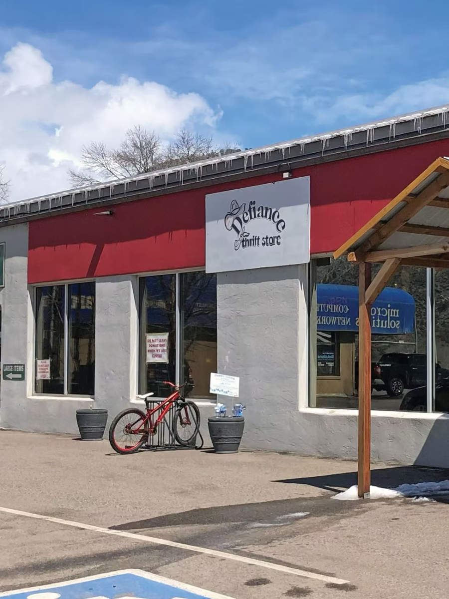 Bicycle, Vehicle, Wheel, Postal Office. Text: thrift store DONATIONS LARGE ITEMS